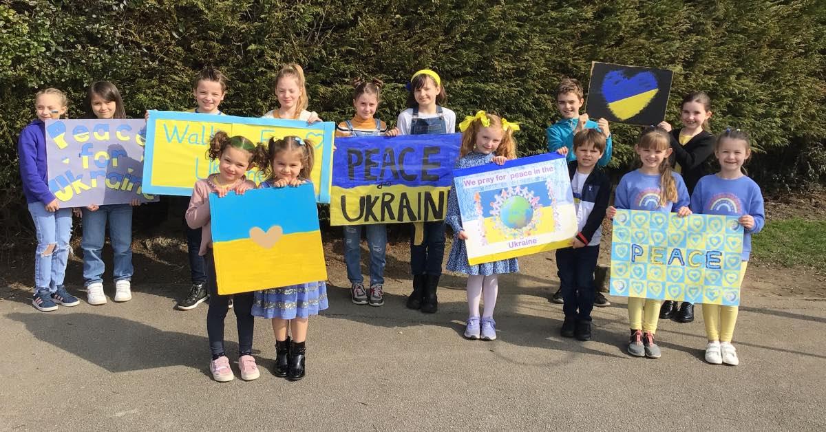 Pupils at St Joseph's with their banners which they created for the Ukraine walk.