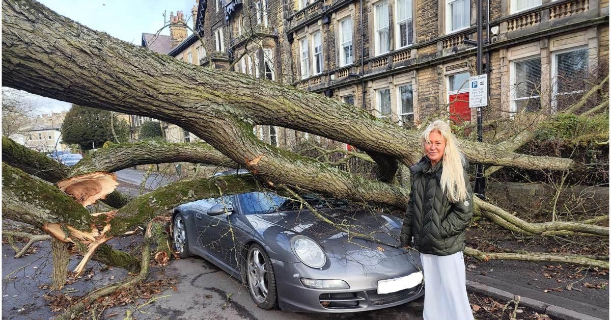 Zenya Dunn, standing next to her partner's Michael's Porsche this morning.