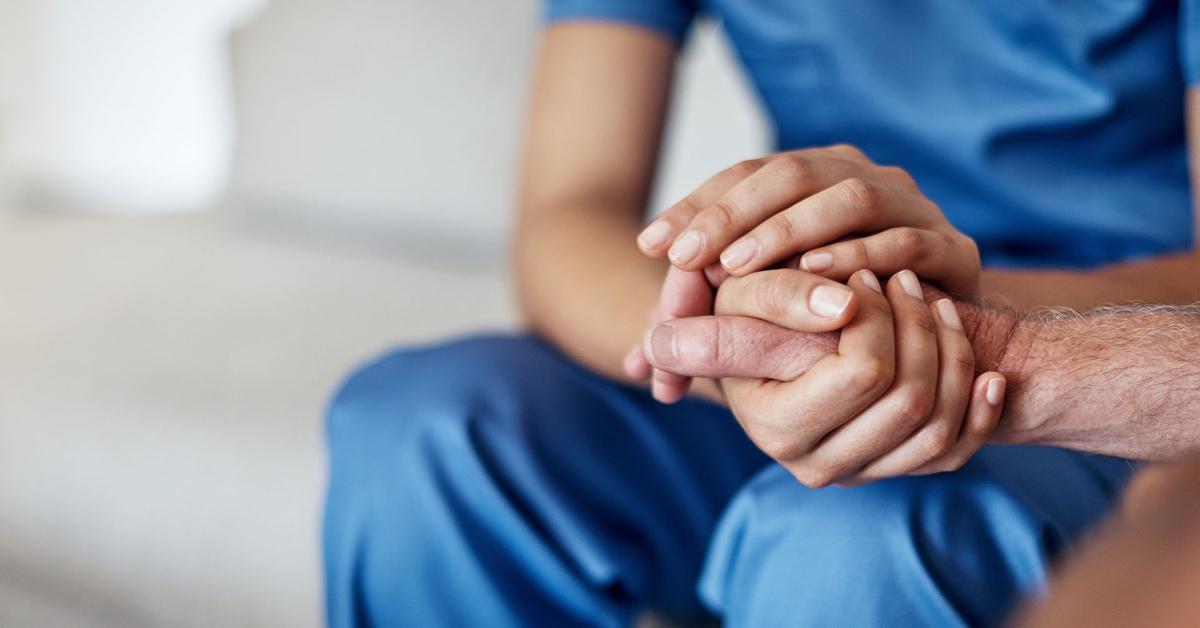 cropped-shot-of-a-female-carer-consoling-a-senior-patient-at-the-nursing-home