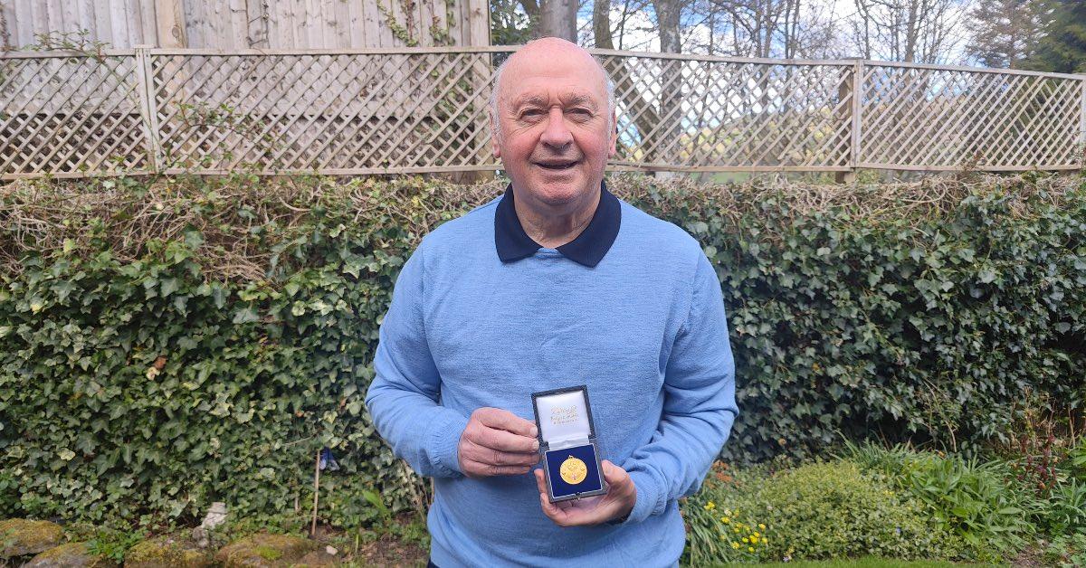 Alan with his First Division title medal.