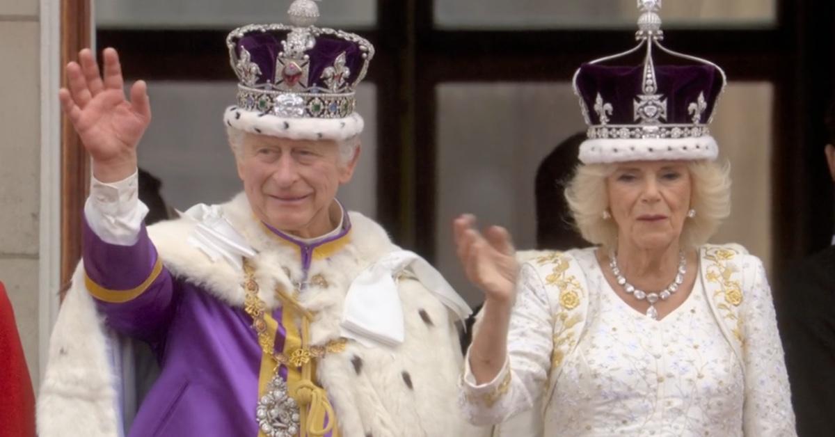 Queen Camilla pictured in her white silk dress.