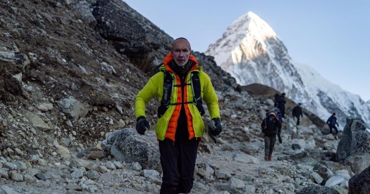 Adam pictured running the Everest marathon from base camp.