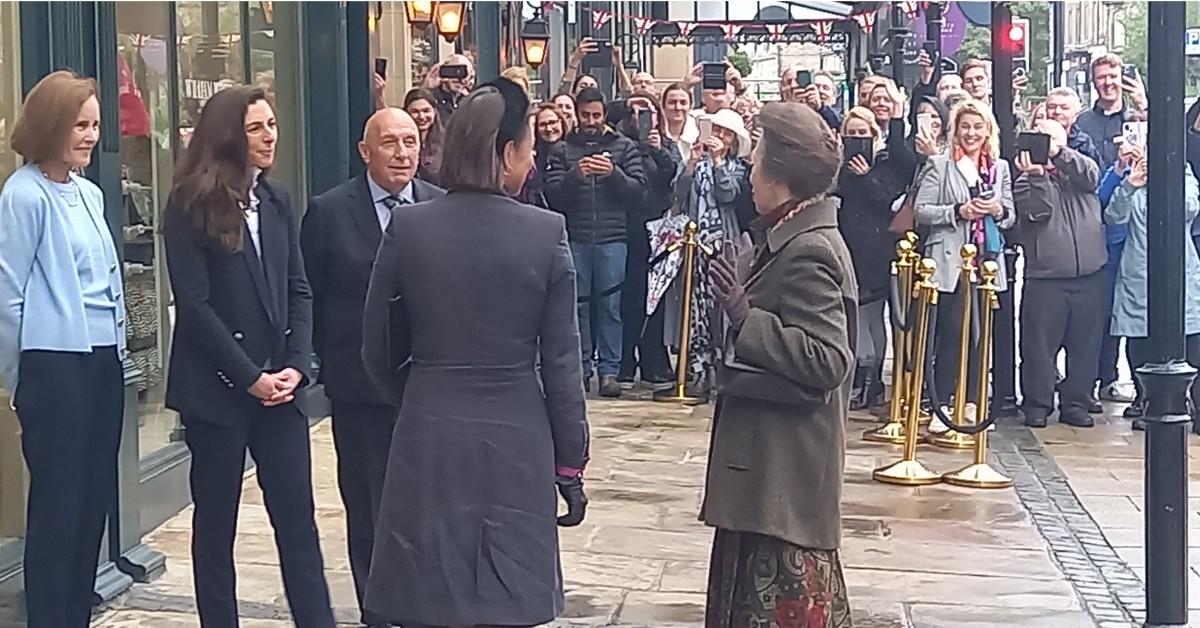 Photo of the Princess Royal meeting William Woods and staff at Woods of Harrogate.