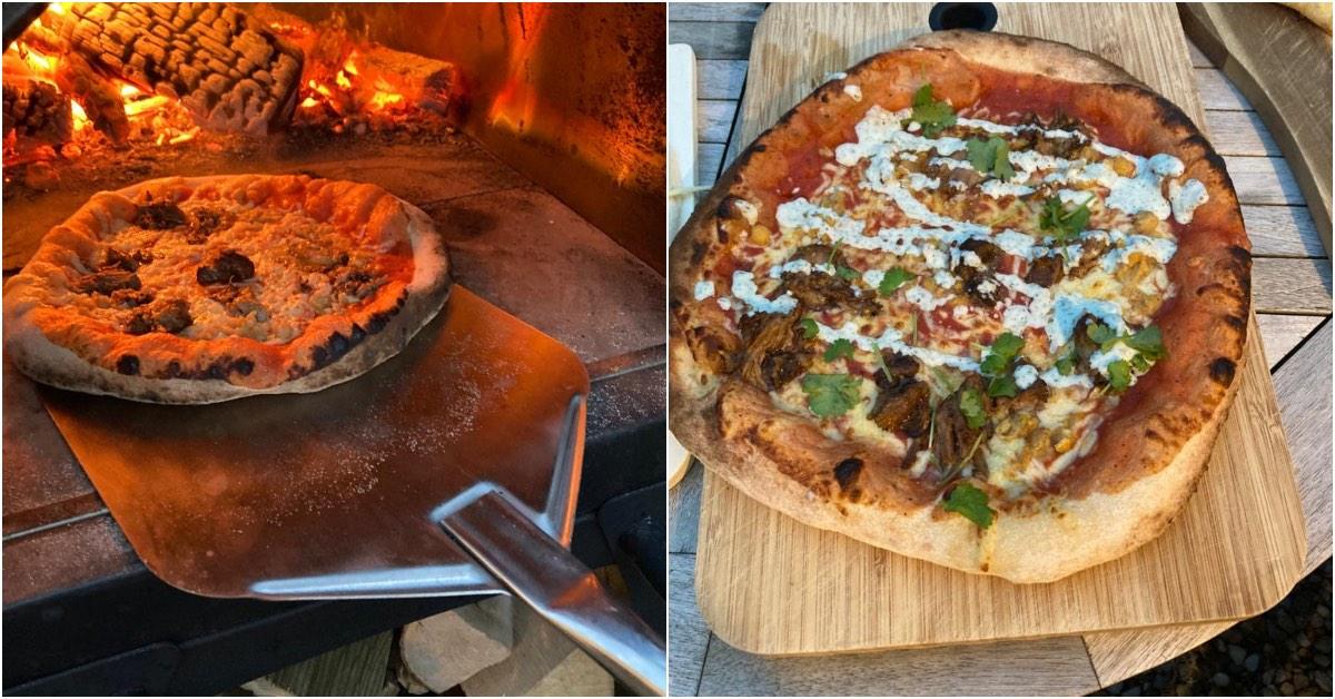 Paul and Carol serve up wood fired pizzas.