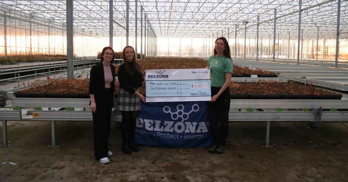 Staff at Belzona making the donation to the White Rose Forest.