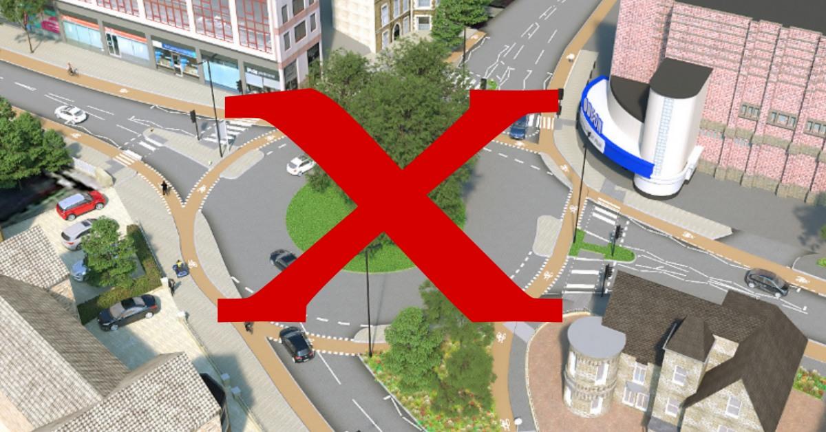 A computer visualisation of part of the Harrogate Station Gateway scheme, with a large red x over the Dutch-style roundabout, which has been scrapped.