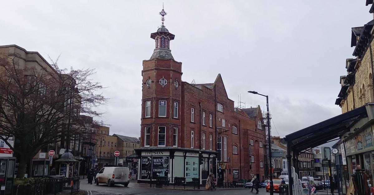 Wide-angle photo of Harrogate Theatre, showing its full height.