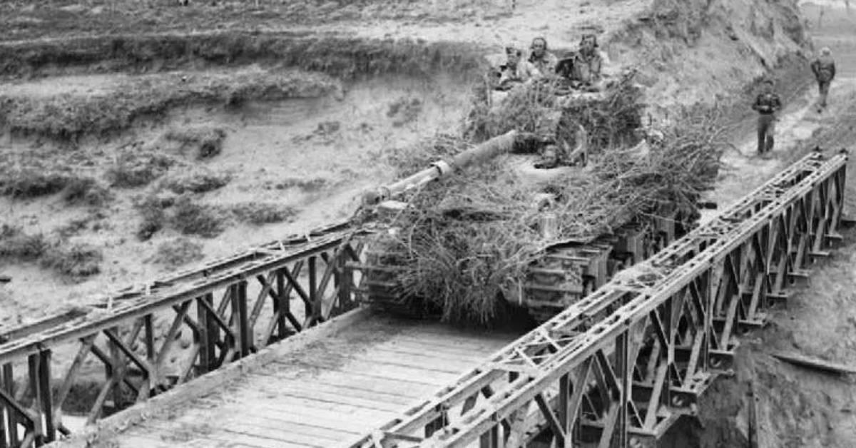 bailey-bridge-a-heavily-camouflaged-sherman-tank-crosses-a-bailey-bridge-over-the-river-santerno-near-imola-12-april-1945