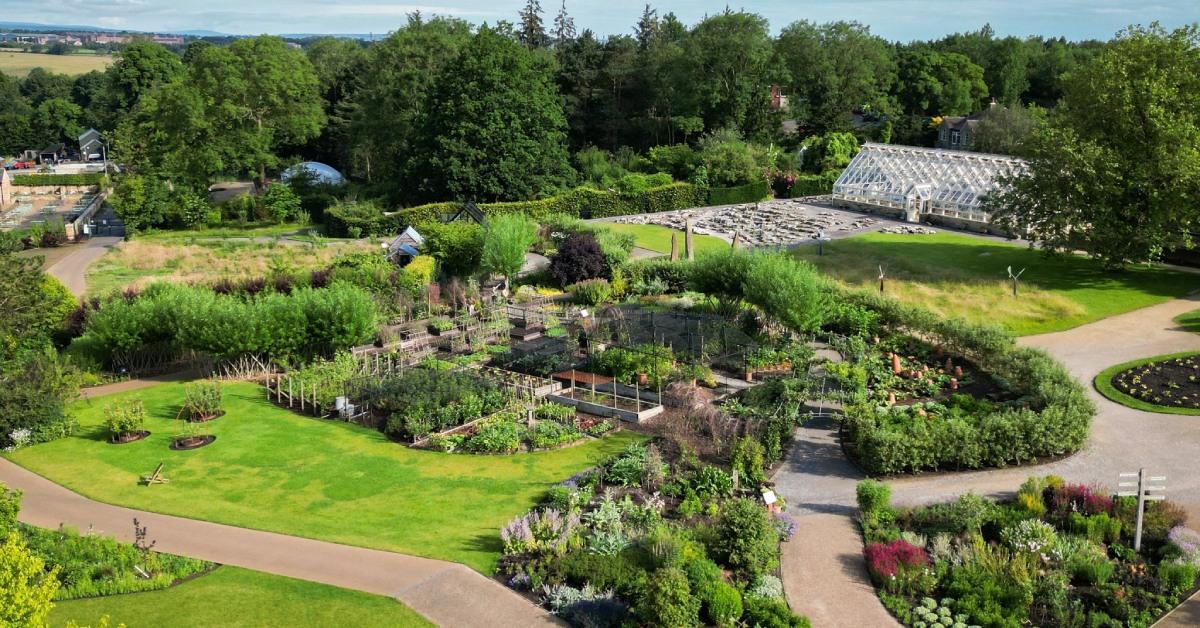 drone-shot-of-kitchen-garden-borders-and-alpine-house