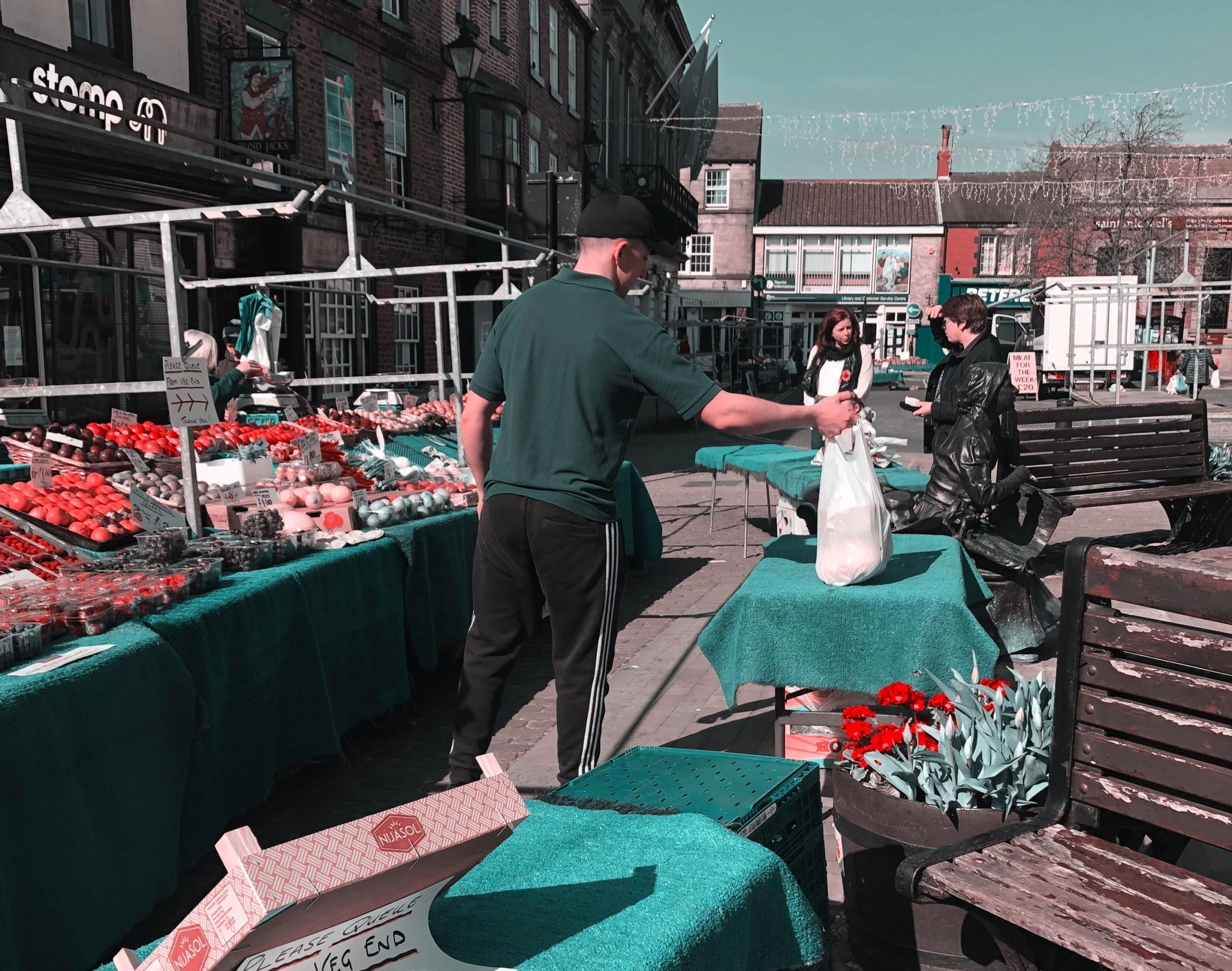 trader-with-bag-at-table