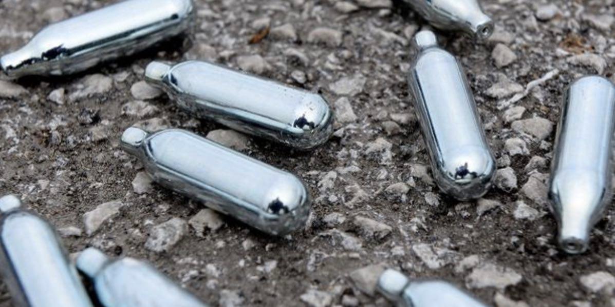 nitrous-oxide-canisters-on-street