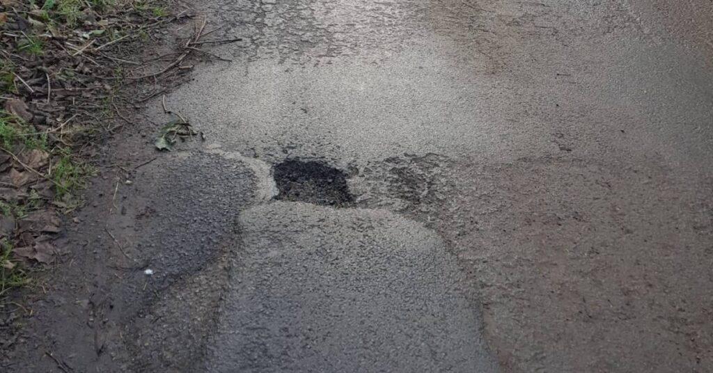 Photo of pot holed Sharow Road