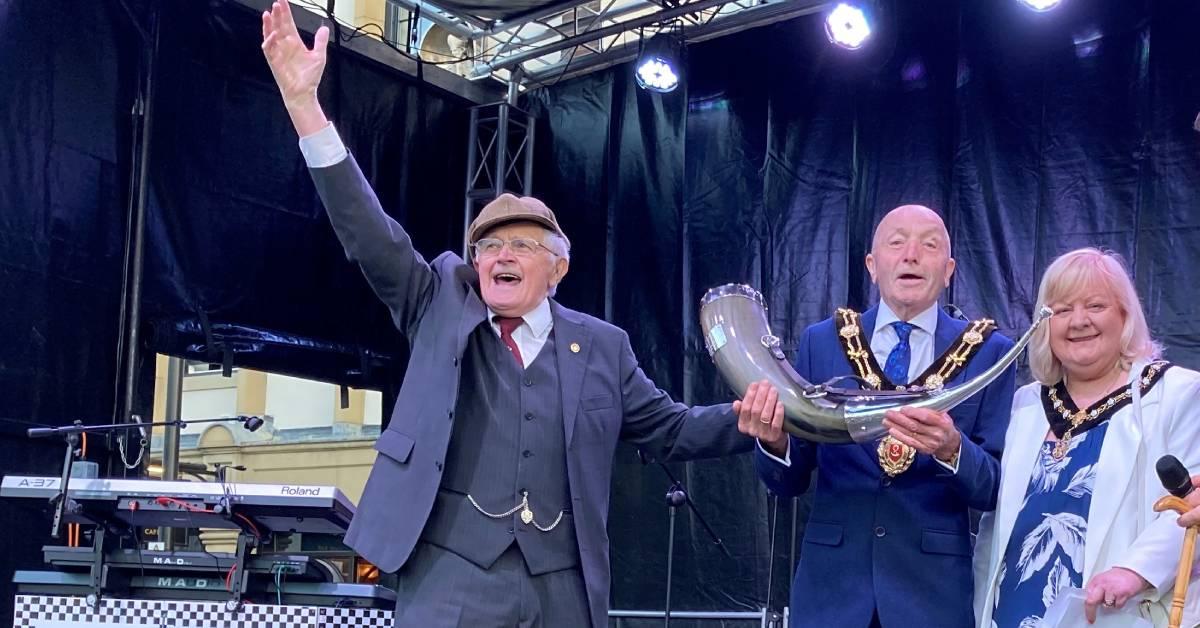 John Richmond hands over the new horn to the Mayor and Mayoress of Ripon