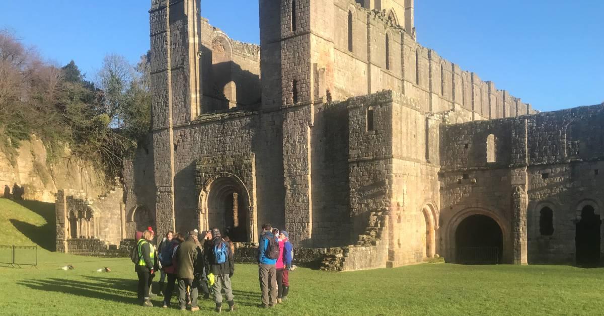 Pilgrims arrive at Fountains Abbey