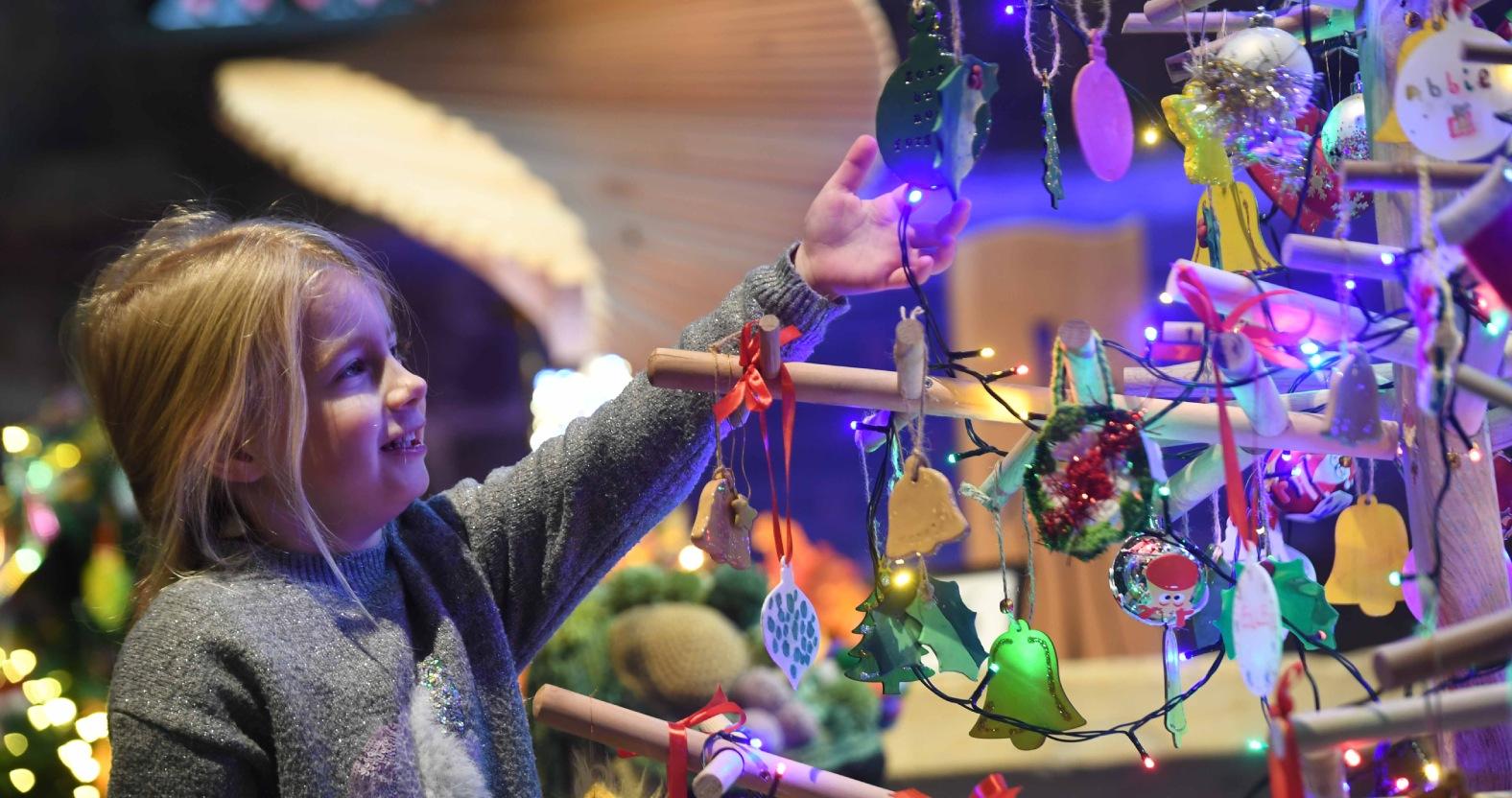 4-year-old-sadie-kent-takes-a-closer-look-at-one-of-the-trees-picture-gerard-binks