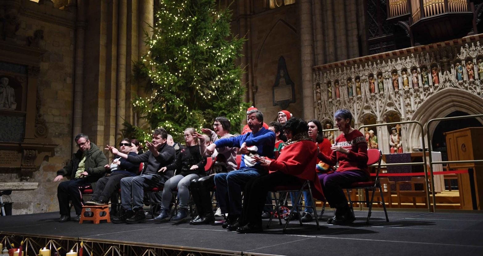 henshaws-carols-by-candlelight-concert-at-ripon-cathedral-pictured-the-choir-on-stage-singing-christmas-carols-picture-gerard-binks-1