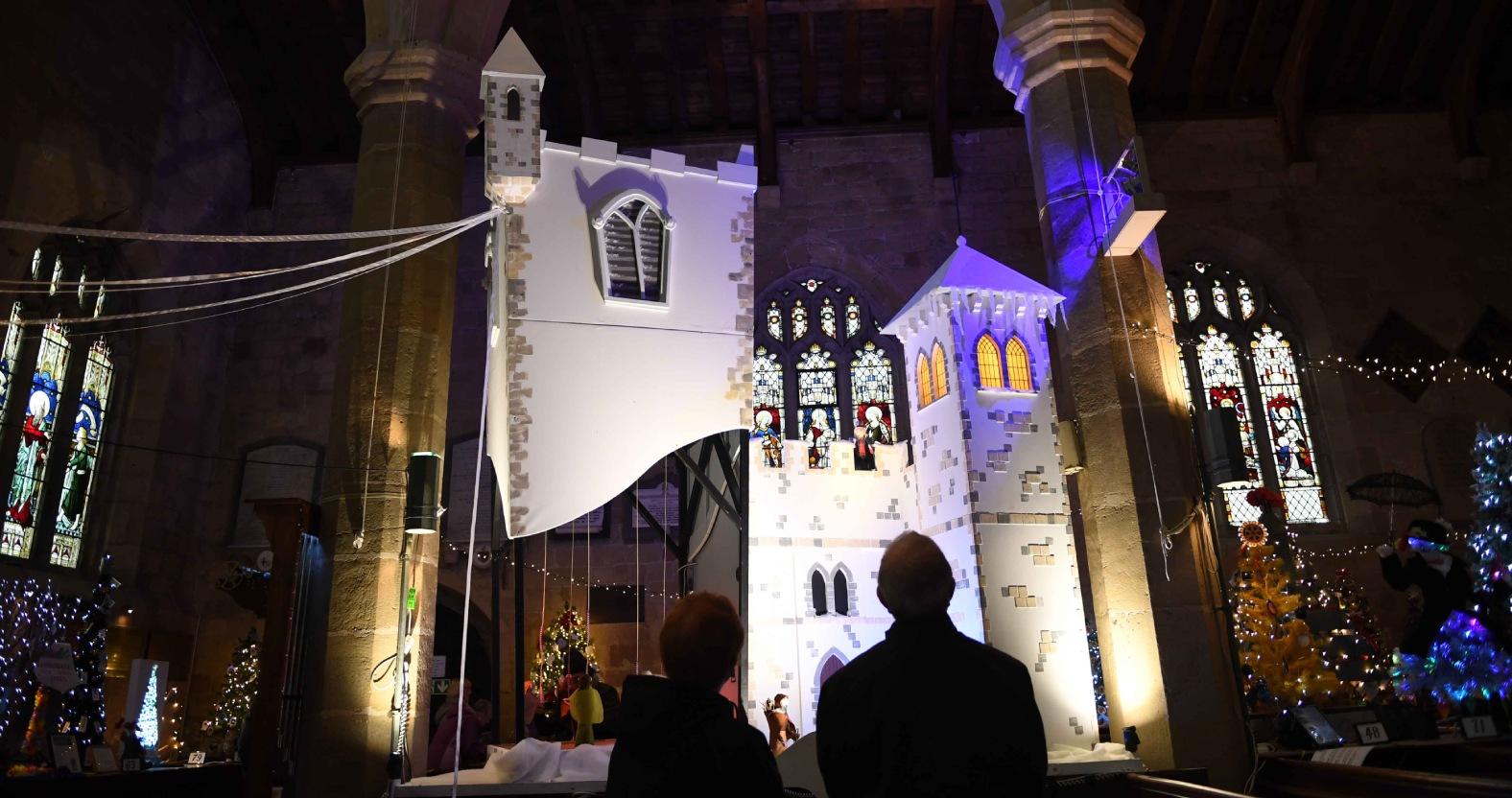 kb-christmas-tree-festival-st-johns-church-knaresborough-pictured-visitors-view-the-exhibits-on-display-picture-gerard-binks