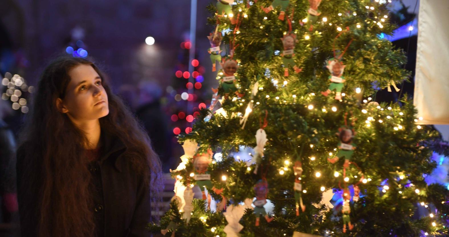 margaret-sikes-from-california-admires-one-of-the-christmas-trees-picture-gerard-binks