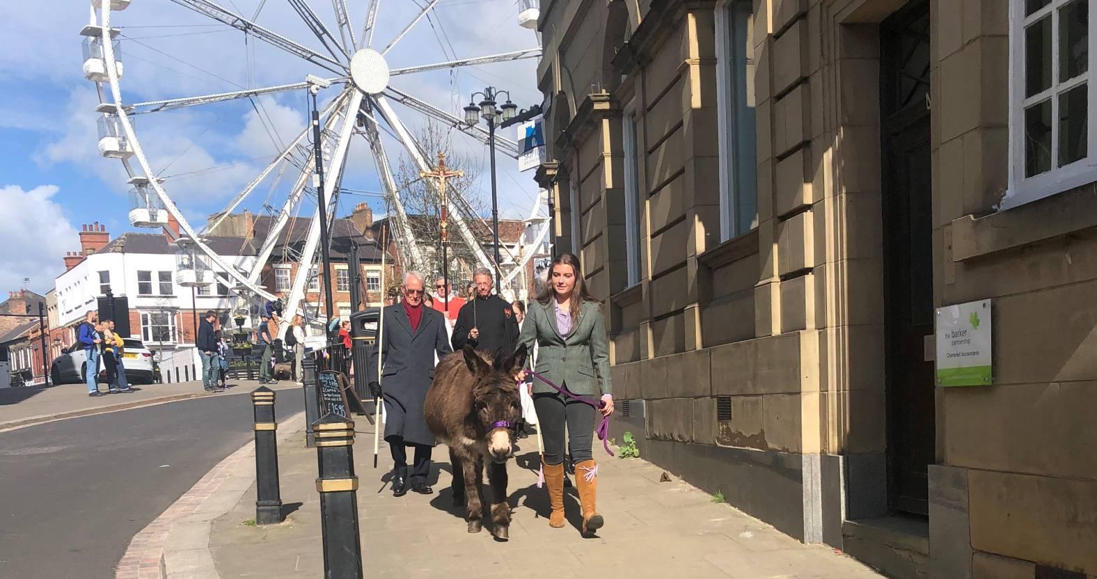 ripon-13th-april-2025-lily-horn-with-lily-the-donkey-heads-the-procession