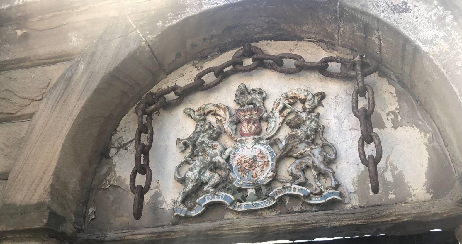 ripon-15th-april-2025-crest-at-gateway-to-former-house-of-correction
