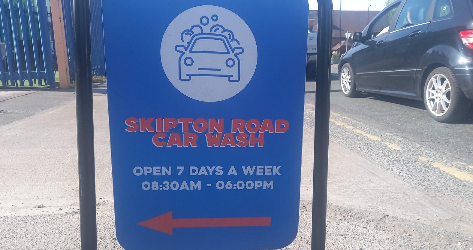 skiptonrdcarwash-bluesign