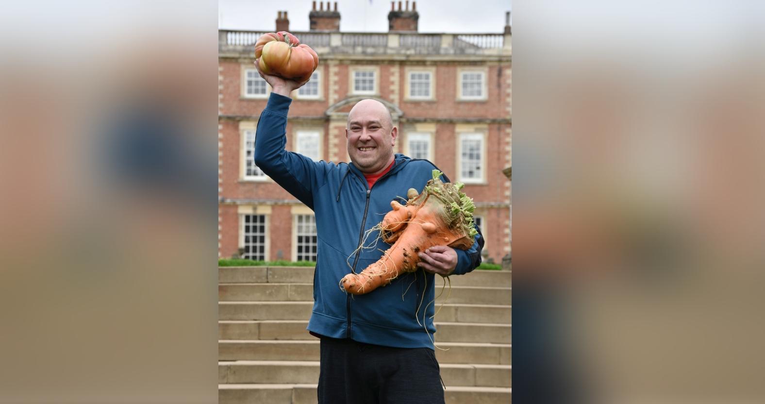 chris-marriott-from-mansfield-with-his-uk-record-beating-carrot-and-tomato