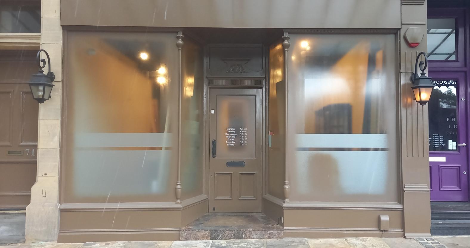 rhodeswood-newshop-headon