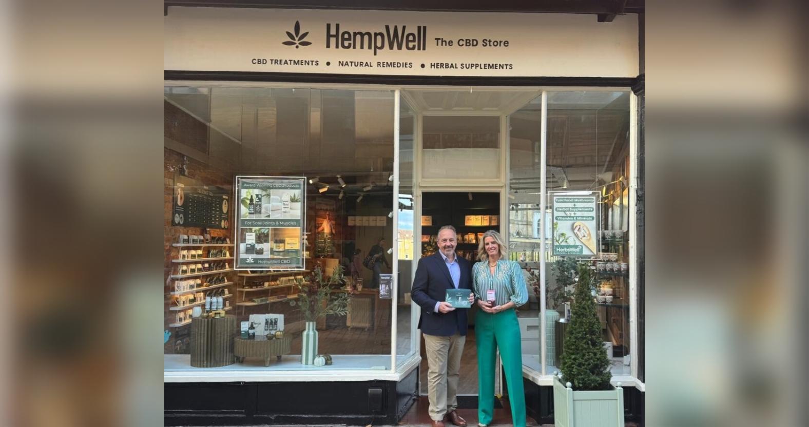 directors-phil-and-lisa-infront-of-shop