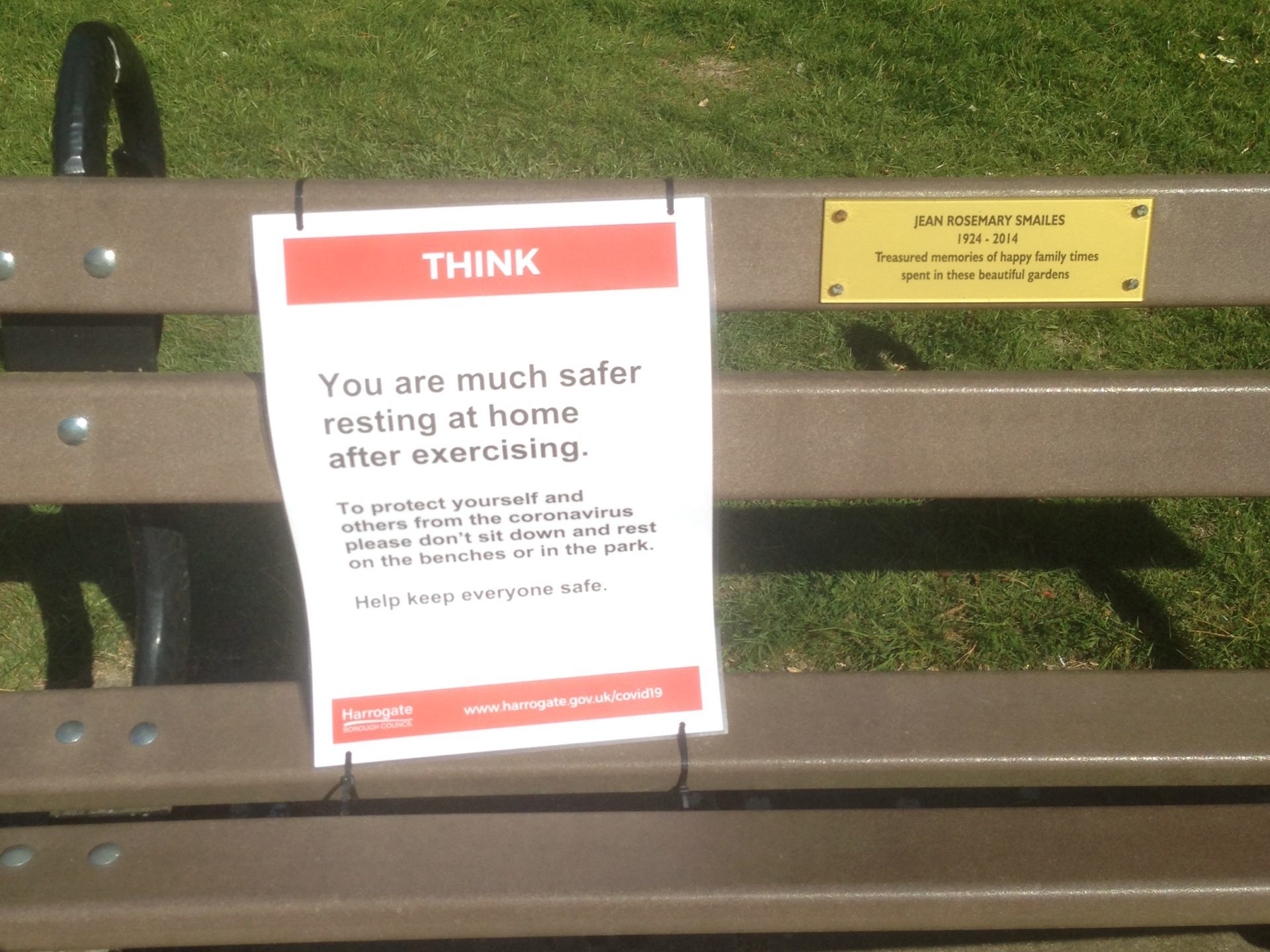 Signs banning people from sitting on benches in the Valley Gardens