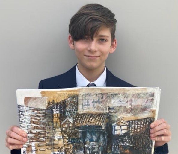 Young artist Hugo with his painting