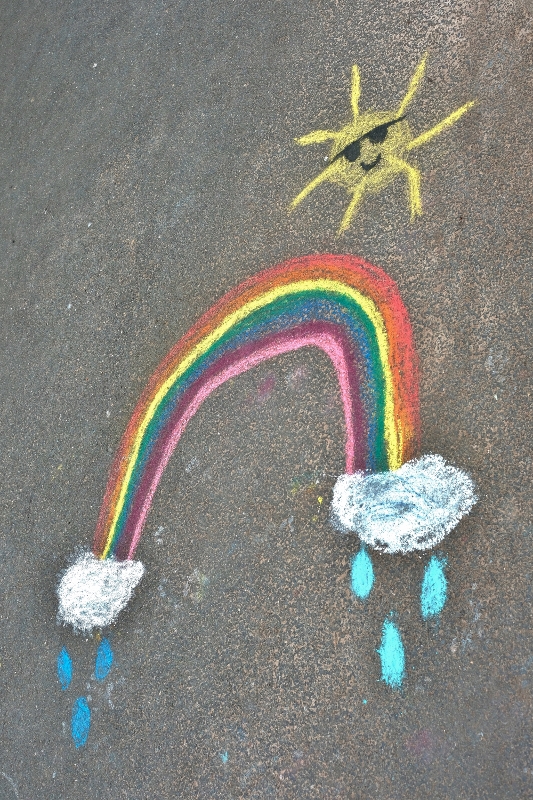 Photograph of rainbow on a playground