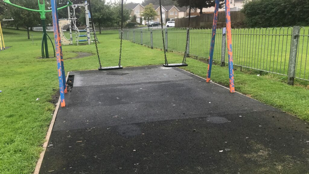 Photograph of the damaged surface at the Grove Lane play area