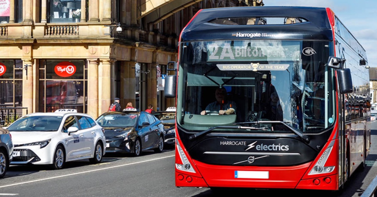 Electric bus driving through Harrogate town centre.
