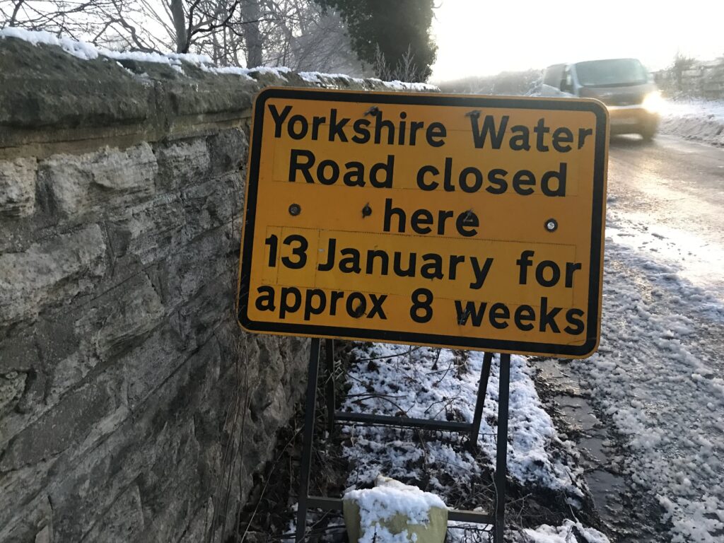 Photos of the respective road closure signs