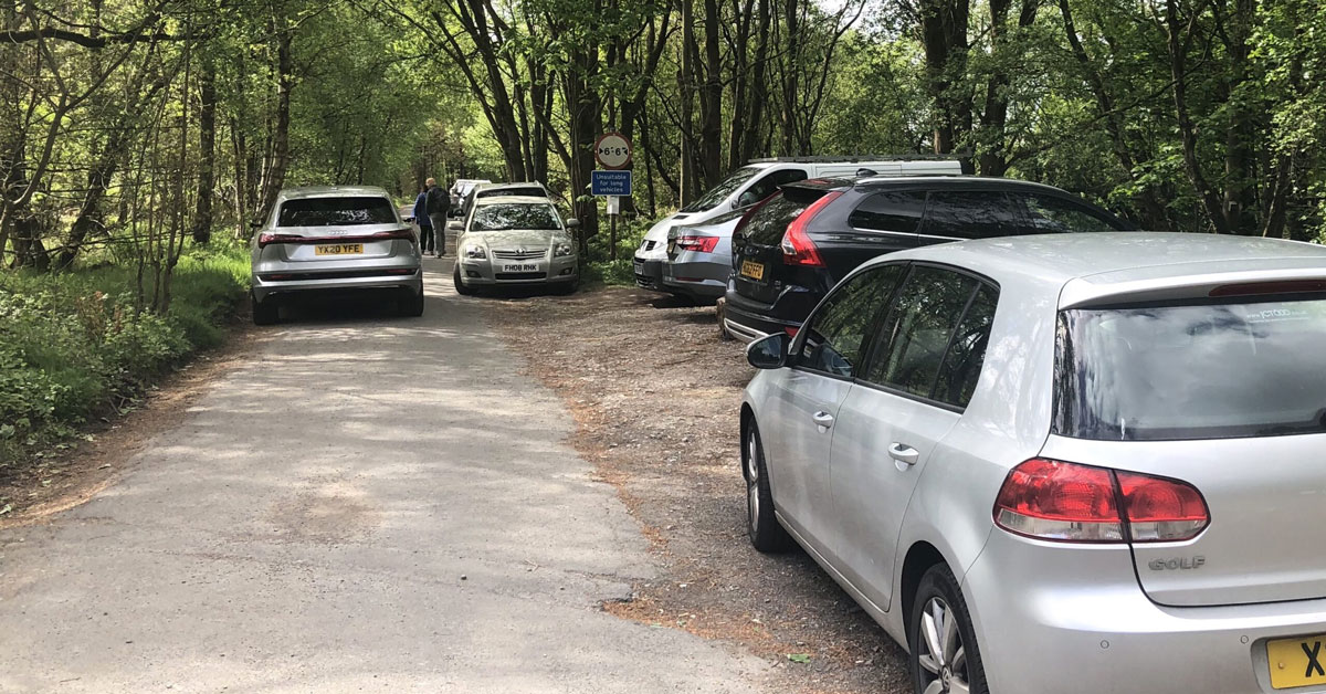 Cars parked outside Swinsty reservoir in the first week of lockdown restrictions being eased.