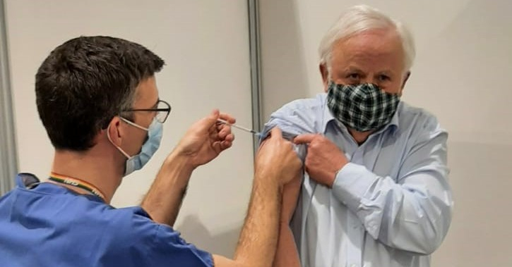 Jim Clark receives his covid vaccination from Dr Ian Dilley