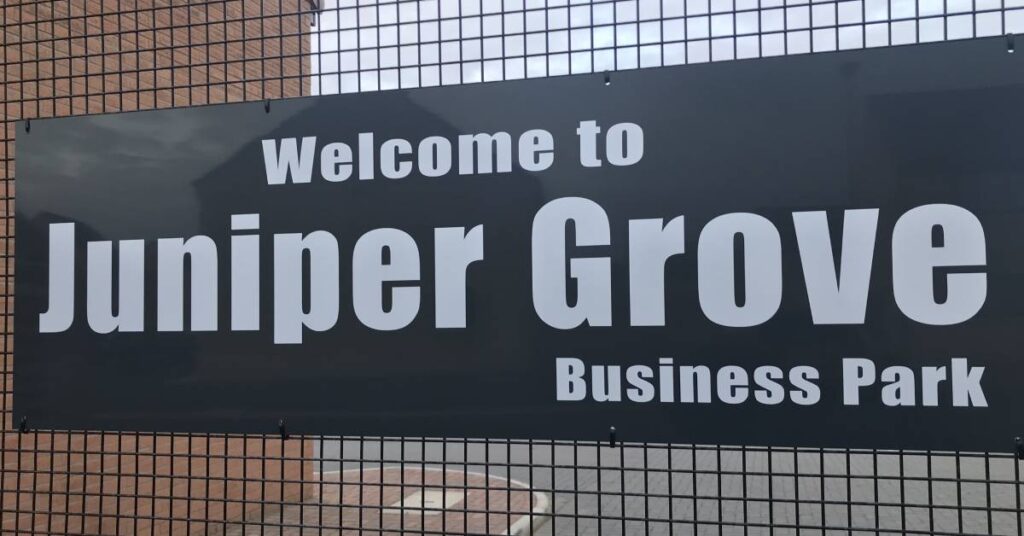 Photo of the sign at the Juniper Grove Business Park