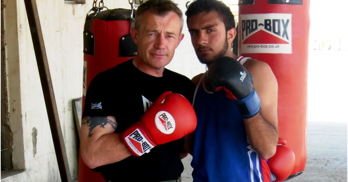 Boxing coach Rob Smith with Omar in Afghanistan