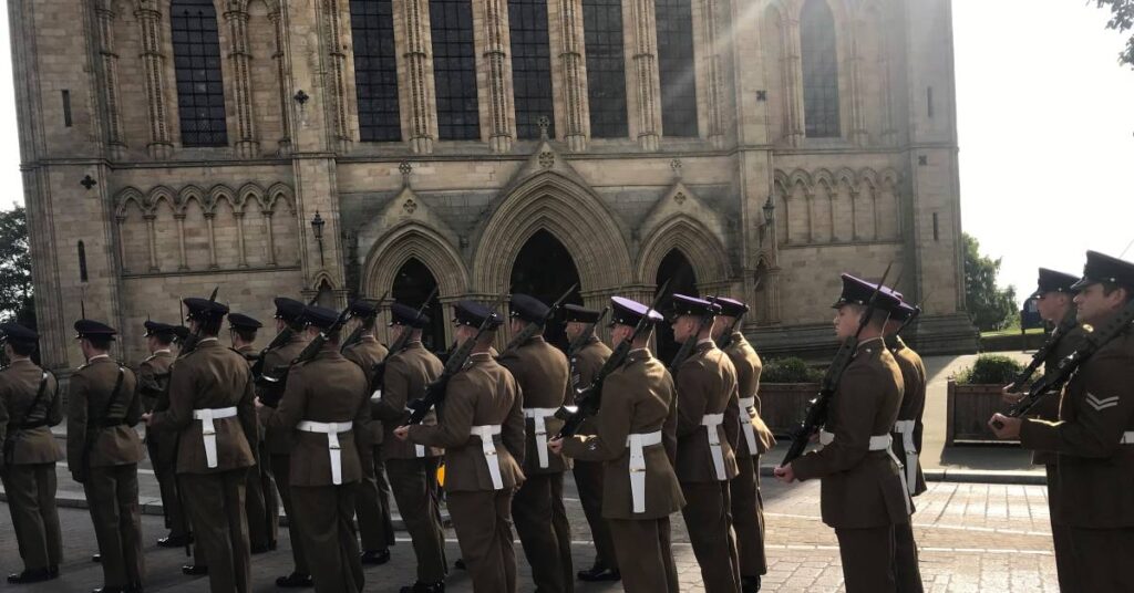 Photo of engineers outside the cathedral