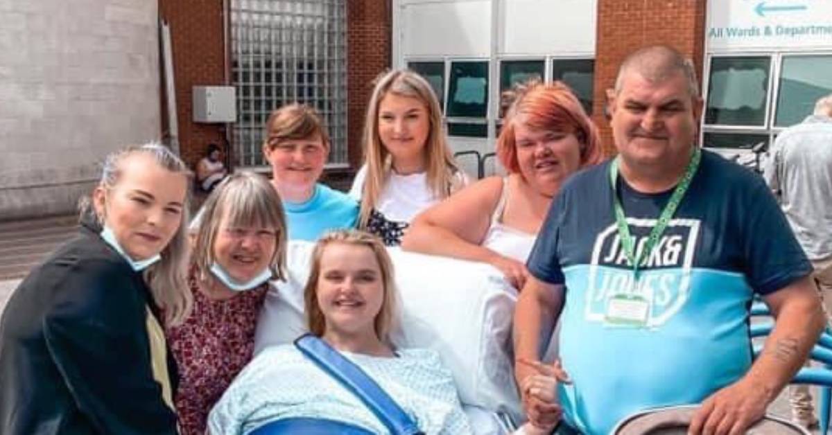 Lucie with her family and friends at hospital.