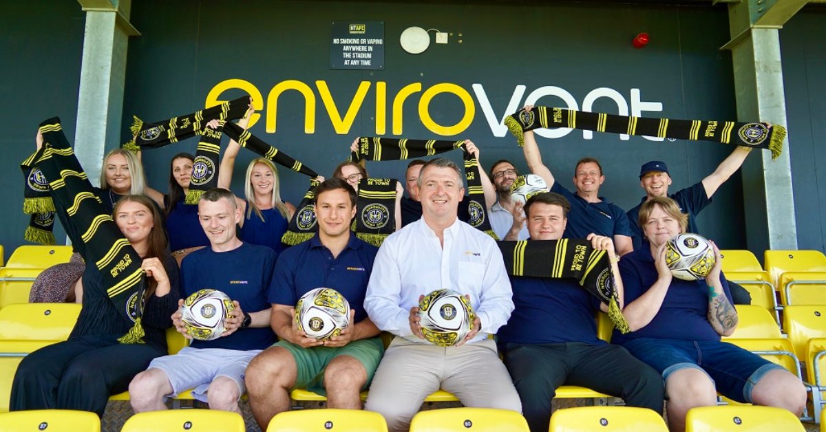 Andy Makin EnviroVent MD, with past winners and runners up (from 2021/22) of the Enviro Way Awards, an internal award voted for by staff members.