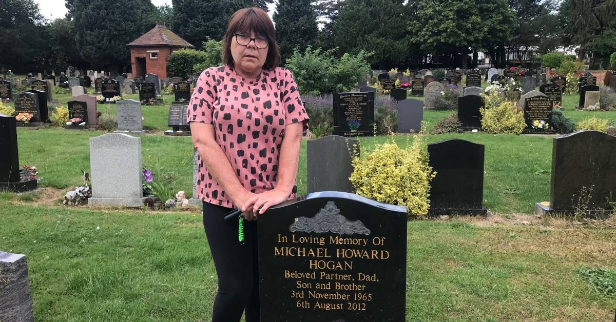 Tracey Bland at her Partner Michael's grave