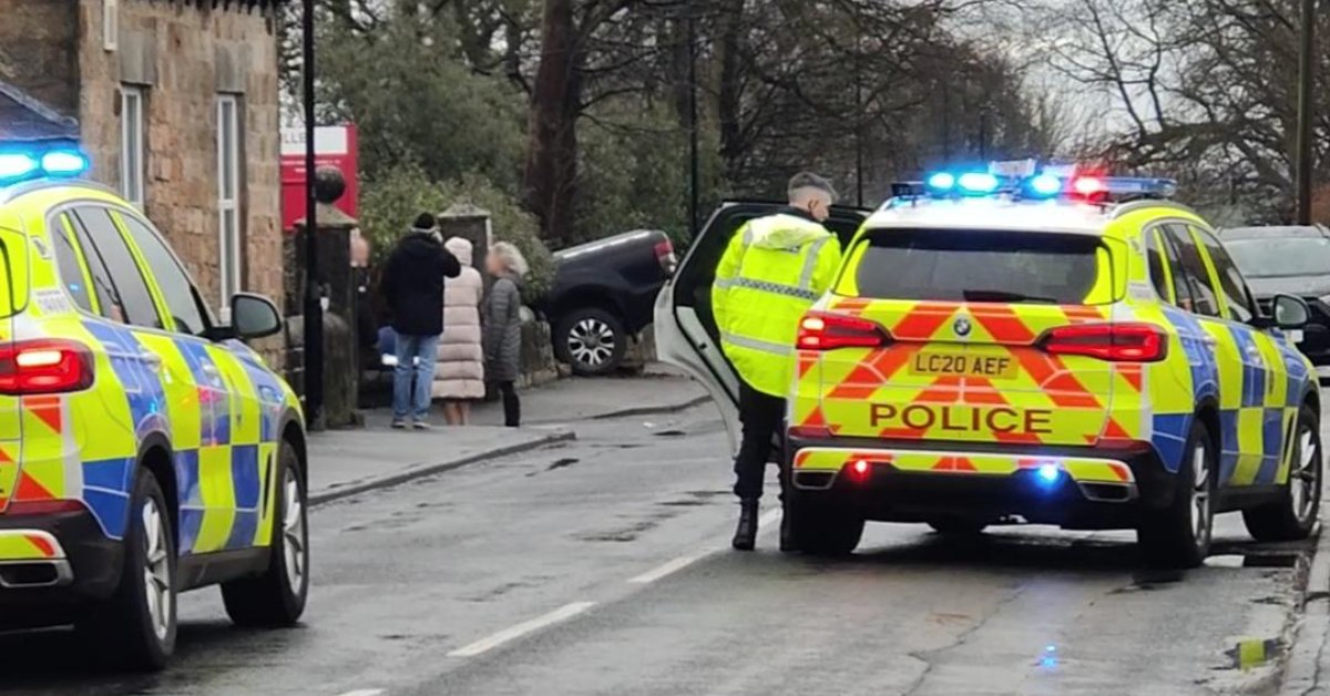 A pick-up trick has crashed into a wall outside Ashville College