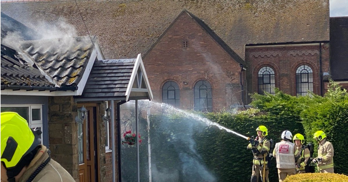 Photo of firefighters tackle a house fire in Starbeck.